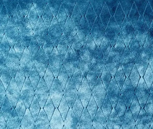 Velours bleu gravé d'un semis de losanges