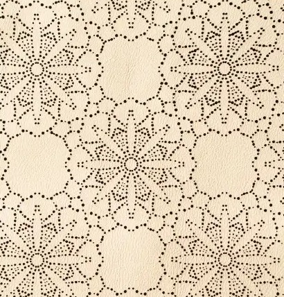 Cuir crème perforé de rosaces pointillistes