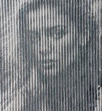 Portrait gravé en trames verticales dans la pierre bleue
