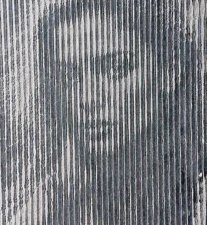 Portrait gravé en trames verticales dans la pierre bleue