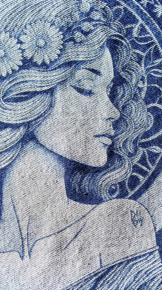 Portrait art nouveau gravé au laser sur denim indigo