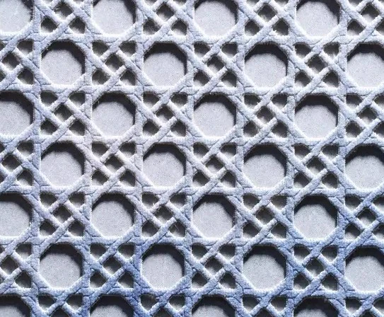 Textile bleu clair découpé au laser en cannage